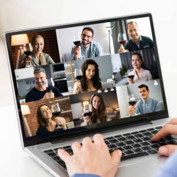 close up of woman video chatting on laptop
